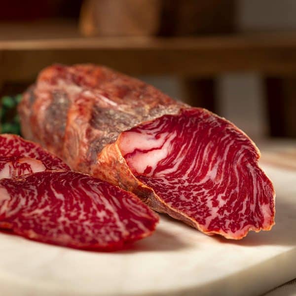 IBERICO BELLOTA GEPÖKELTES SCHWEINEFLEISCH PRESA FISAN