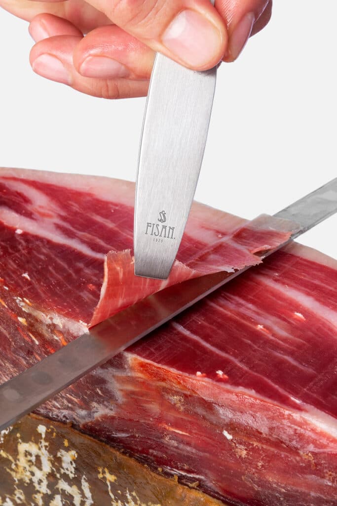 Corte a cuchillo de jamón ibérico FISAN, donde se forman cristales de tirosina