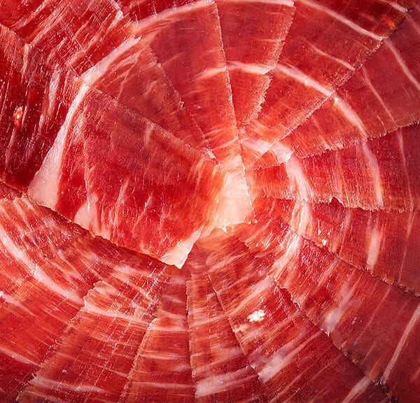 CRISTALES DE TIROSINA EN EL JAMÓN IBÉRICO: ¿QUÉ SON ESOS PUNTOS BLANCOS Y POR QUÉ APARECEN?