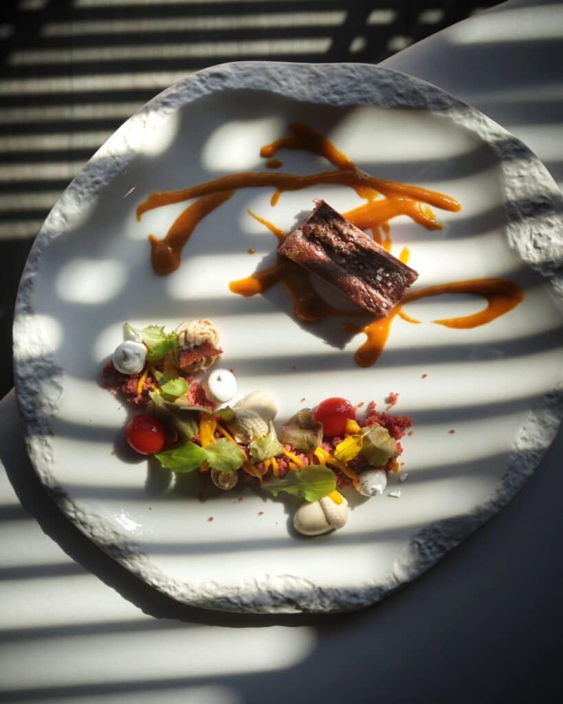 Presa de Bellota Ibérica FISAN, con un toque sutil a humo hecho con Sarmiento y acabada en el Kamado